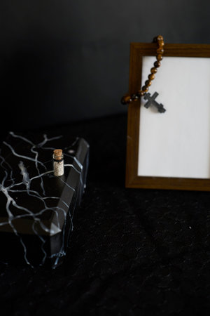 glass pendant with ashes in the form of a bottle, memorialの写真素材