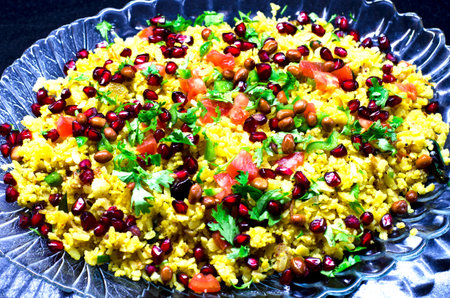 Poha, a popular Indian vegetarian dish prepared with flattened rice.