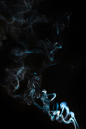 Smoke isolated on the black backgroundの写真素材