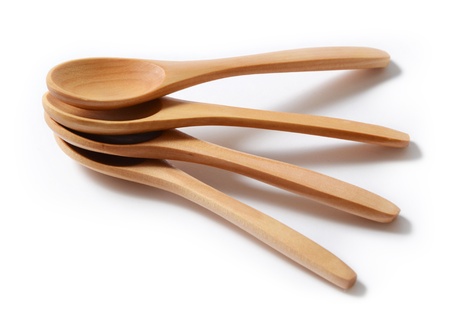 Traditional wooden spoon isolated on white backgroundの写真素材