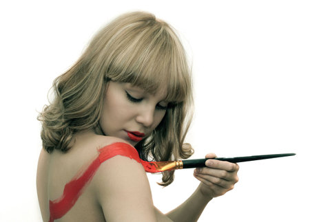 young beauty girl, painting on the body (photo)の写真素材