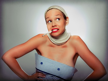 beautiful young woman with cigaretteの写真素材