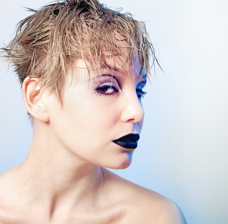 Portrait of young beautiful freaky girl with  stylish makeup の写真素材