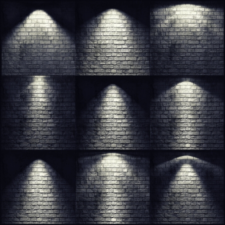 different types of lights on the brick wallの写真素材