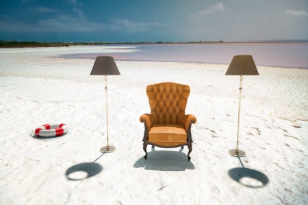 luxury leather armchair on the beach  photo compilation concept の写真素材