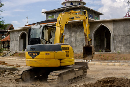 Heavy duty construction machinery working at construction site.