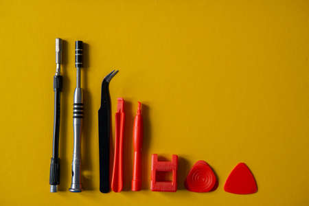 Tools on a yellow background.の写真素材