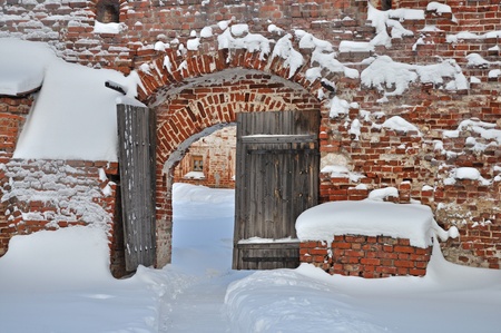 Old wooden gate in medieval russian Kirillo-Belozersky monasteryの写真素材