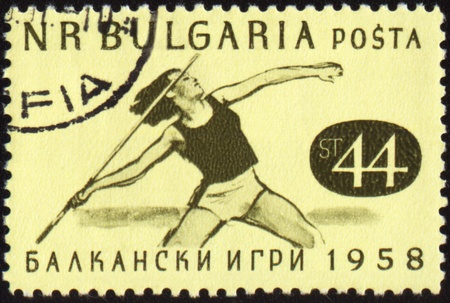 BULGARIA - CIRCA 1958: A post stamp printed in Bulgaria shows javelin throwing, devoted to Balkan games, circa 1958の写真素材
