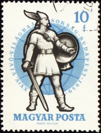HUNGARY - CIRCA 1959: A post stamp printed in Hungary shows Warrior of 10th Century, series, circa 1959の写真素材