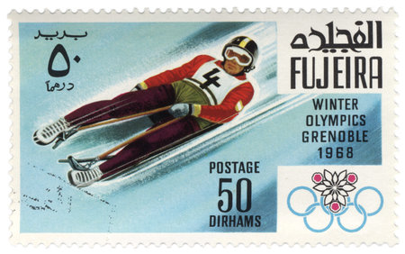 Fujeira - CIRCA 1968  A stamp printed in Fujeira shows descent to sledge, devoted to the Winter...