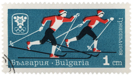 BULGARIA - CIRCA 1968: A post stamp printed in Bulgaria shows ski race, dedicated to Winter games in Grenoble, series, circa 1968のeditorial素材