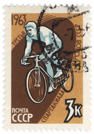 USSR - CIRCA 1963  A stamp printed in USSR shows bicycling, devoted to the 3rd Sports of the USSR, series, circa 1963のeditorial素材