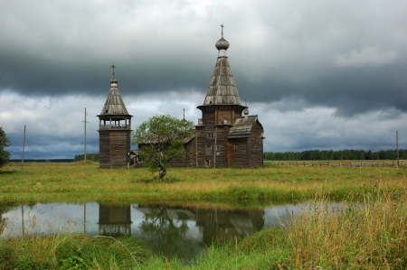 Ancient russian wooden church in Saunino village, north Russiaの写真素材