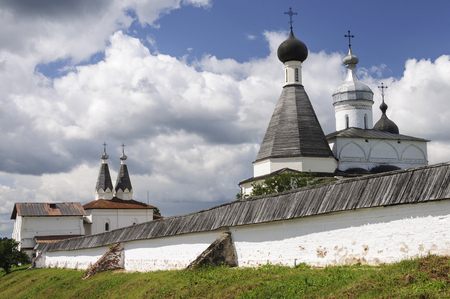 Domes of the Ferapontov Monastery on cloudy sky background, sunny summer day, Vologda region, Russiaのeditorial素材
