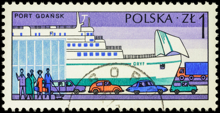 MOSCOW, RUSSIA - APRIL 25, 2016: A stamp printed in Poland shows Marine Station with people and cars in Polish Harbour Gdansk, series "Polish Harbours", circa 1976のeditorial素材