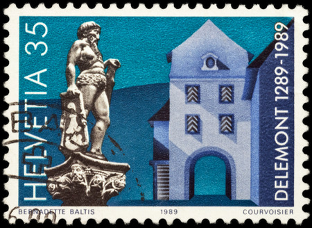 MOSCOW, RUSSIA - JUNE 02, 2016: A stamp printed in Switzerland shows ancient Swiss city Delemont, devoted to the 700th Anniversary of Delemont, circa 1989のeditorial素材