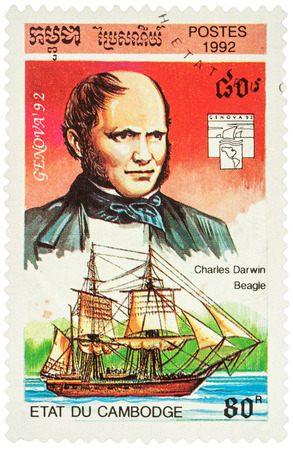 MOSCOW, RUSSIA - NOVEMBER 12, 2016: A stamp printed in Cambodia shows English scientist Charles Darwin and ship "Beagle", series "Exhibition Genova '92 - Navigators and their Ships", circa 1992のeditorial素材