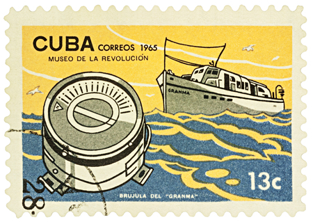 MOSCOW, RUSSIA - NOVEMBER 26, 2016: A stamp printed in Cuba shows Cuban ship Granma and compass, series "Museum of the Revolution", circa 1965のeditorial素材