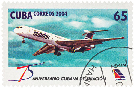 MOSCOW, RUSSIA - January 16, 2017: A stamp printed in Cuba shows passenger aircraft IL 62M, series "The 75th Anniversary of Cubana Airline", circa 2004のeditorial素材