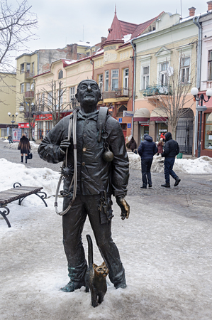 Mukachevo, Ukraine - January 31, 2017: Statue of chimney sweeper with catのeditorial素材
