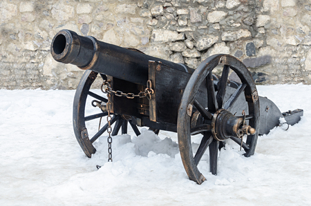 Old black gun in ancient castle of Mukacheve, Ukraine, winter timeのeditorial素材