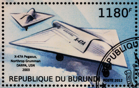 Moscow, Russia - July 17, 2017: A stamp printed in Burundi shows aircraft Northrop Grumman X-47A (2003) - a demonstration Unmanned Combat Aerial Vehicle, series "Aircraft X", circa 2012のeditorial素材