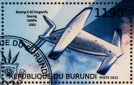 Moscow, Russia - July 17, 2017: A stamp printed in Burundi shows experimental unmanned aerial vehicle Boeing X-50 Dragonfly (2003), series "Aircraft X", circa 2012のeditorial素材
