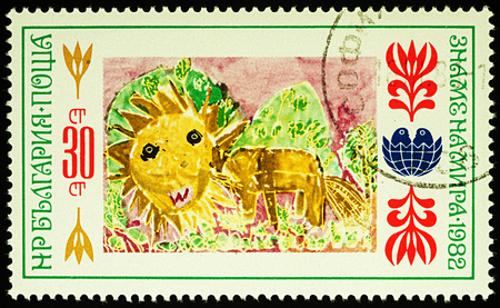 Moscow, Russia - August 03, 2017: A stamp printed in Bulgaria shows children's drawing of lion, series "International Children's Assembly Banner of Peace", circa 1982のeditorial素材
