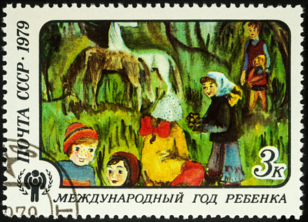 Moscow, Russia - August 04, 2017: A stamp printed in USSR (Russia) shows children's drawing "After Rain", series "International year of the child", circa 1979のeditorial素材