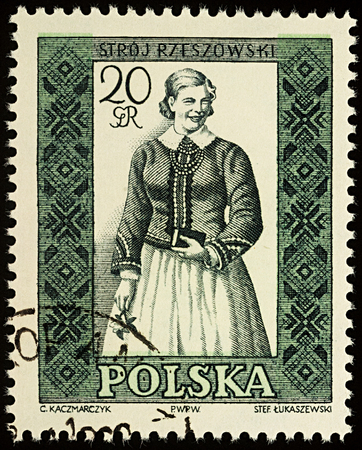 Moscow, Russia - August 12, 2017: A stamp printed in Poland, shows woman in a traditional costume, Rzeszow region, seriesのeditorial素材
