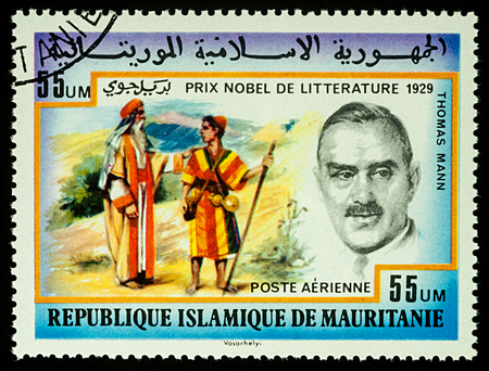 Moscow, Russia - September 11, 2017: A stamp printed in Mauritania, shows portrait of German writer Thomas Mann (1875-1955), series "Nobel prize winners", circa 1977のeditorial素材