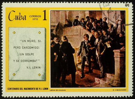 Moscow, Russia - November 01, 2017: A stamp printed in Cuba, shows painting "Lenin at the University of Kazan" by V.Vishnyakov, series "100 Year birthday Lenin's", circa 1970のeditorial素材