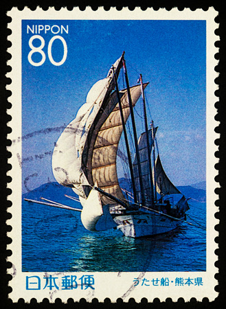 Moscow, Russia - November 14, 2017: A stamp printed in Japan shows Japanese traditional fishing sailboat, circa 1999のeditorial素材