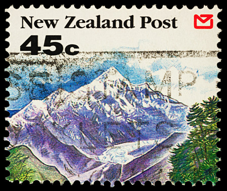Moscow, Russia - November 25, 2017: A stamp printed in New Zealand, shows mountain landscape with glacier ice, series "Landscapes", circa 1992のeditorial素材