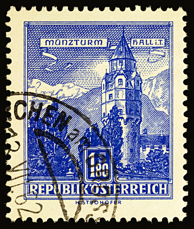 Moscow, Russia - November 30, 2017: A stamp printed in Austria shows Munzturm Hall in Tyrol, Austria, series "Architectural Monuments in Austria", circa 1960のeditorial素材