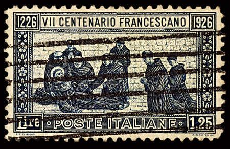 Moscow, Russia - December 07, 2017: A stamp printed in Italy shows death of St. Francis of Assisi, series "The 700th Anniversary of the Death of St. Francis of Assisi", circa 1926のeditorial素材