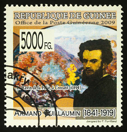 Moscow, Russia - December 17, 2017: A stamp printed in Guinea shows French artist Armand Guillaumin and his picture "Ravine of Folly, Crozant", series "Paintings by Armand Guillaumin", circa 2009のeditorial素材