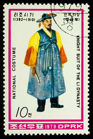 Moscow, Russia - January 05, 2018: A stamp printed in DPRK (North Korea), shows ancient Korean knight in ceremonial dress, series "National Costumes of the Li Dynasty", circa 1979のeditorial素材