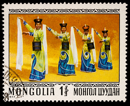 Moscow, Russia - January 08, 2018: A stamp printed in Mongolia, shows Mongolian folk dance, Dajarka, series "Folk Dances", circa 1977のeditorial素材