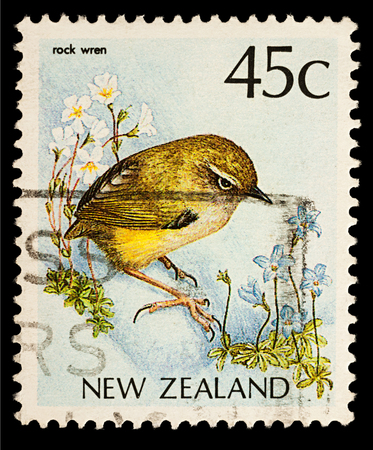 Moscow, Russia - February 04, 2018: A stamp printed in New Zealand, shows bird New Zealand Wren (Xenicus gilviventris), series "Native Birds", circa 1991のeditorial素材