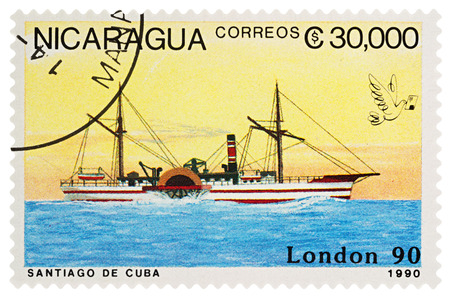 Moscow, Russia - March 24, 2018: A stamp printed in Nicaragua shows old paddle-steamer "Santiago de Cuba", series "Old Steam Ships", circa 1990のeditorial素材