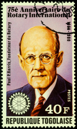 Moscow, Russia - November 08, 2019: stamp printed in Togo shows portrait of Paul Percy Harris (1868-1947), dedicated to the 75th Anniversary of Rotary International, circa 1980のeditorial素材