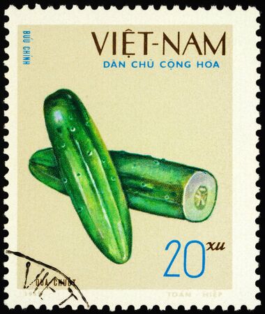 Moscow, Russia - January 17, 2020: stamp printed in Vietnam shows cucumbers, series "Native Fruits", circa 1970のeditorial素材