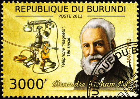 Moscow, Russia - February 22, 2020: stamp printed in Burundi, shows Alexander Graham Bell (1847-1922), American inventor, scientist, and engineer, creator of first practical telephone, circa 2012のeditorial素材