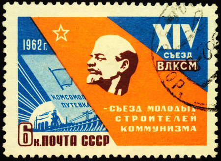 Moscow, Russia - April 18, 2020: stamp printed in USSR (Russia), shows stele with Lenin profile,...
