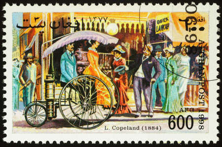 Moscow, Russia - June 02, 2020: stamp printed in Afghanistan shows retro car by American inventor Lucius Copeland (1884) and society of that time, series Antique Cars, circa 1998のeditorial素材