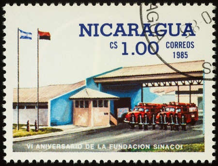 Moscow, Russia - September 13, 2020: stamp printed in Nicaragua shows fire brigade at fire-station, circa 1985のeditorial素材