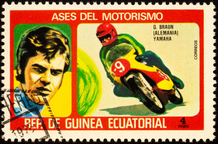 Moscow, Russia - September 14, 2020: stamp printed in Equatorial Guinea shows racing motorcyclist and portrait of German motorcycle road racer Dieter Braun, series Motorcyclists, circa 1976のeditorial素材
