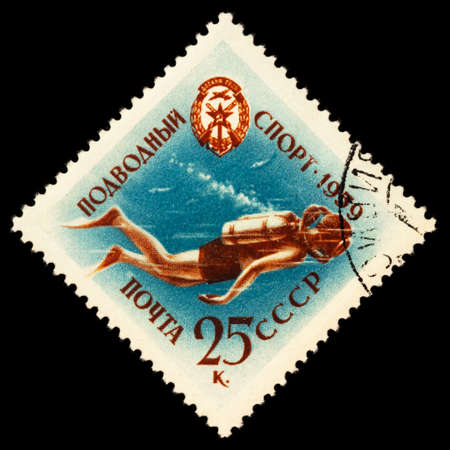 Moscow, Russia - September 15, 2020: stamp printed in USSR (Russia) shows scuba diver, series Voluntary Society of the Assistance to Army, circa 1959のeditorial素材